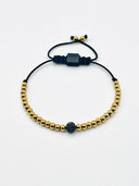 Pulseira aço dourada e bola preta Punto Fino